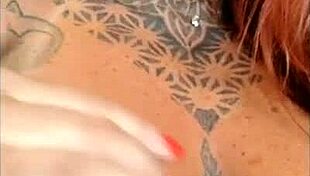 redhead sensualizing her big tits for friend