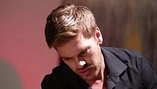 Bound Naked Woman Whitney Wright in Oiled Fetish Scene