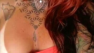 redhead sensualizing her big tits for friend