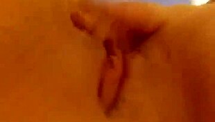 Girlfriend teases with her tits on camera