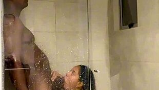 Ebony girlfriend has a hell of a sloppy blowjob in the bathroom