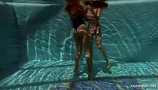 Watch Stefanie Moon and Vyvan Hill Underwater in the Pool