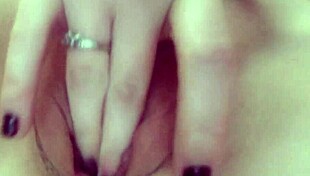 curious wife fingers herself in private moment