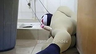 Zentai Slave Bound In Toilet Bondage, Femdom Controls Penis