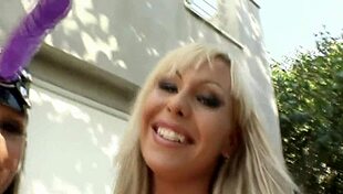 German lesbian babes play with sextoys on their boobs