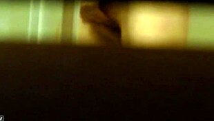 Hidden camera spying on roommate in shower