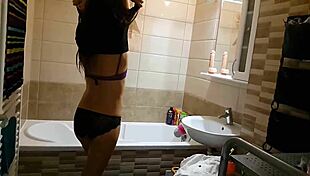 Amateur voyeur captures babe in shower with close-up views