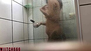 Young guys get wet together in voyeur fun