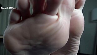 Blonde mother-in-law gives subtle footjob to stepson.