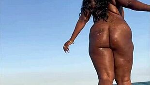 Mature Ebony Milf Enjoys a Relaxing Day at the Beach