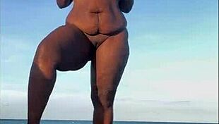 Mature Ebony Milf Enjoys a Relaxing Day at the Beach