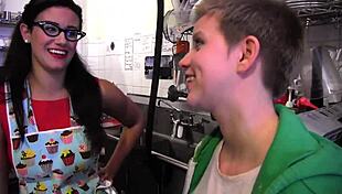 Lesbian girls dive into wet pussies with intense kissing in a messy kitchen