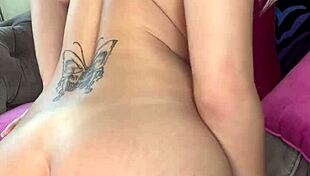Luna Luxe Sprawled on the Couch Teasing Her Shaved Ass with Pink Vibrator