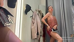 hot slut stripping naked in public fitting room?