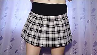 Watch this hot teen dance and reveal her wet pussy under miniskirt in slow motion?