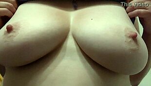 Her wet tits glistened