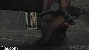 Is this restrained gal ready for punishment in the garage?