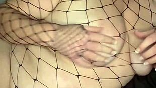 brunette squirts from big natural tits and dildo