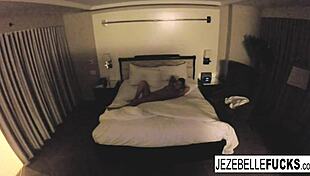 sexy jezebelle bond casually hangs out nude in her hotel room masturbating her pussy