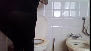 Smoking Babe in Miniskirt Teases with Sensual Ass Moves