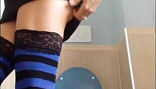 Smoking Babe in Miniskirt Teases with Sensual Ass Moves