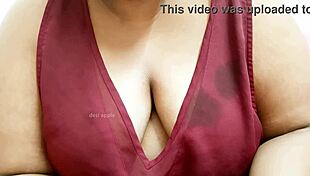 Asian sexy aunty flaunts her big tempting boobs.