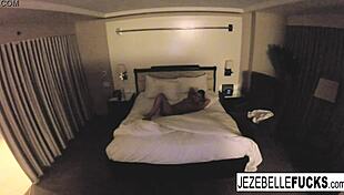 sexy jezebelle bond casually hangs out nude in her hotel room masturbating her pussy