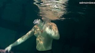 Does Lozhkova tease in see-through shorts underwater in the pool?