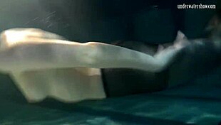 Does Lozhkova tease in see-through shorts underwater in the pool?