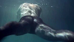 Does Lozhkova tease in see-through shorts underwater in the pool?