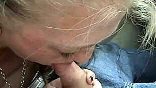 Blonde couple's naughty car blowjob.