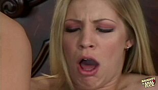 Leah Luv takes two massive cocks in her holes boldly.
