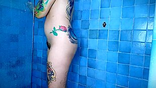 anal plug teasing in the shower while shaving