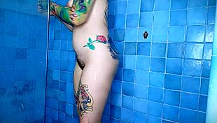 anal plug teasing in the shower while shaving