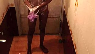 Bathroom lesbian engages in anal licking and assfucking