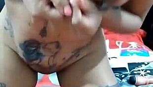 this latina amateur dances seductively for abdiel, showing off her tattoos while masturbating.