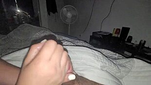 This big black cock gets an amazing handjob