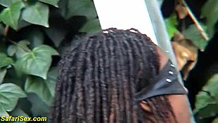 Sever BDSM and large black woman outdoors