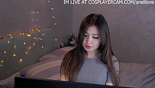 she watches hentai on webcam in asian cosplay