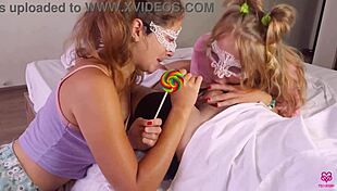 two girls sucking lollipop and then his cock in threesome