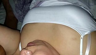 Mother-in-Law Caresses Tits While Relaxed on Bed Watching TV