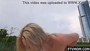 I can't believe I'm flashing my tits on the beach like this!