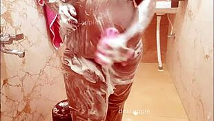 Bengali wife takes a steamy bath, showing off her big tits!