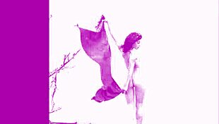 Modelz beauty relaxes in the sand, enjoying the peaceful view