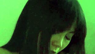 hidden cam catches asian slut giving handjob outdoors