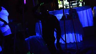 glowing male stripper performs for mature women