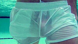 Pool boy in see-thru crossdressing, big cock underwater?