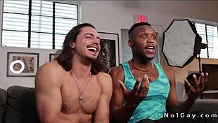 This long-haired dude takes a big black cock bareback on the couch