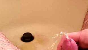 golden shower from old man with small shaved cock