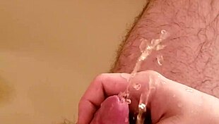 golden shower from old man with small shaved cock